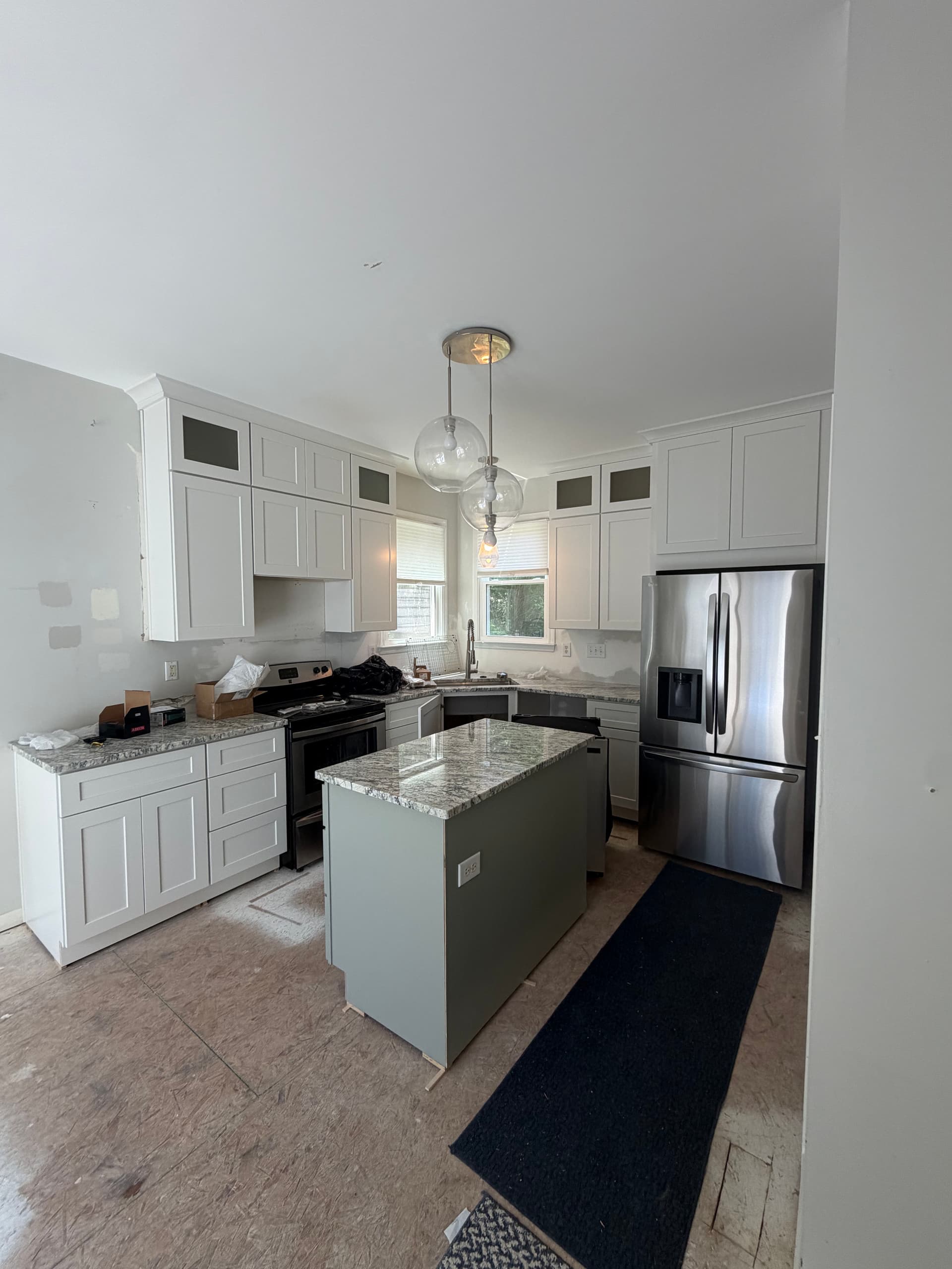 Fresh Stone Countertops Dropped Into This Kitchen Remodel image